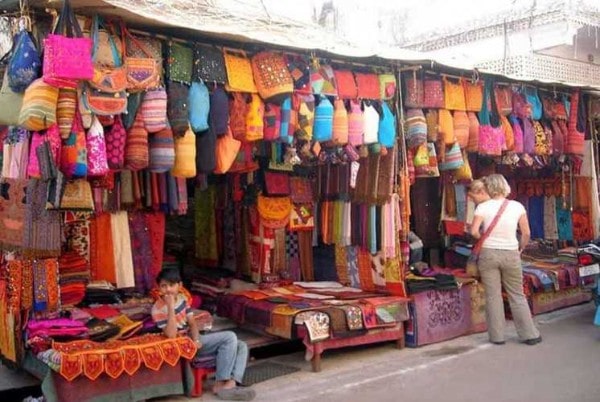 tourist buying things from johri bazaar